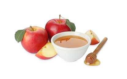 Photo of Delicious apples, leaves, bowl of honey and dipper isolated on white