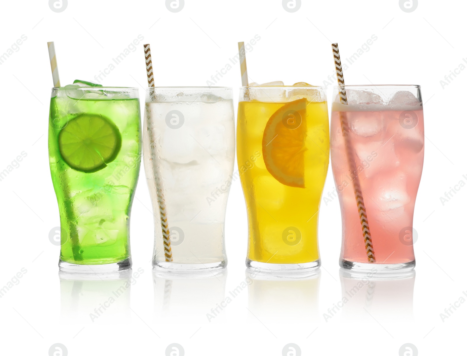 Photo of Delicious refreshing drinks in glasses on white background