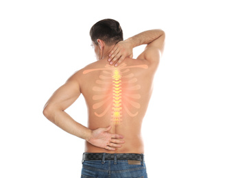 Man suffering from pain in back on white background