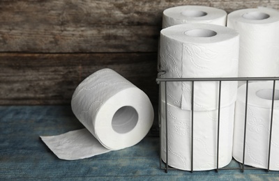 Photo of Toilet paper rolls on table. Personal hygiene