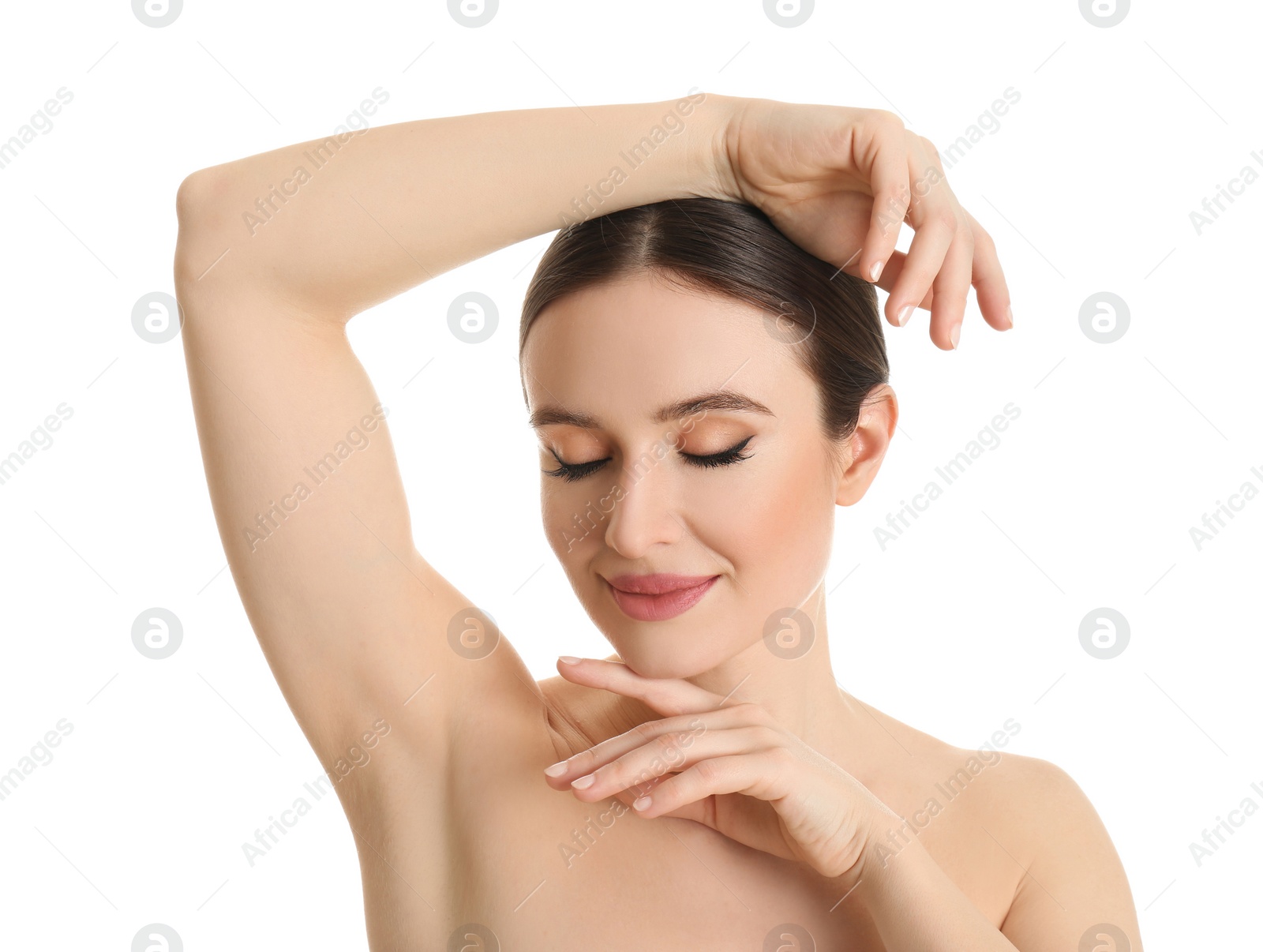Photo of Young beautiful woman showing armpit with smooth clean skin on white background