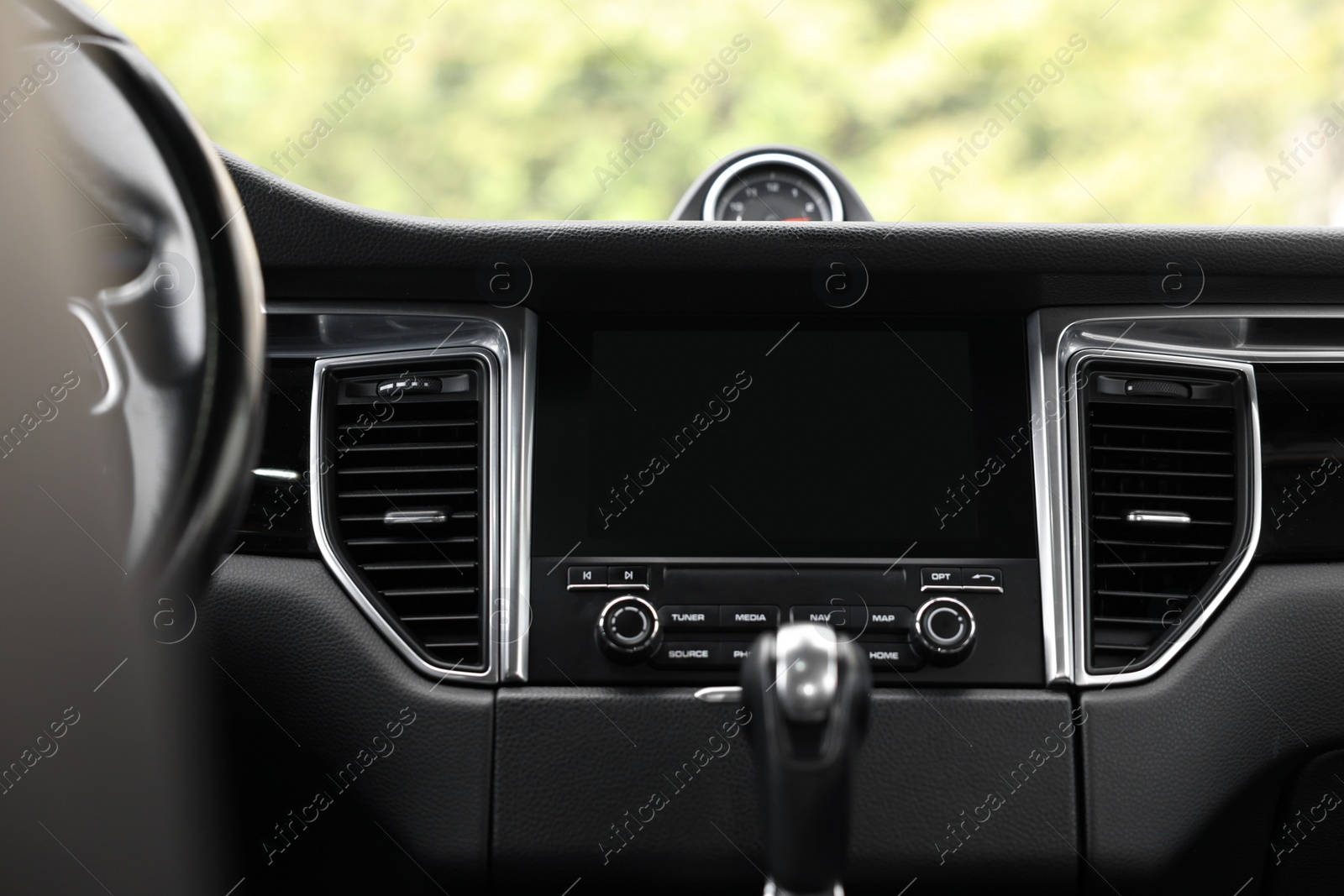 Photo of Modern navigation system with screen in car