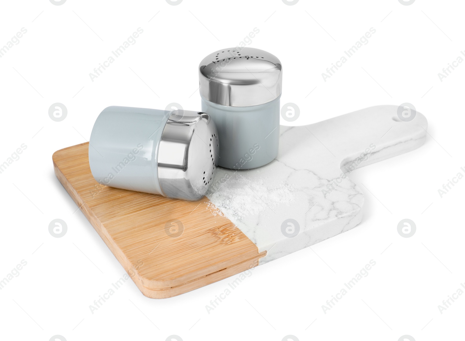 Photo of Salt and pepper shakers isolated on white