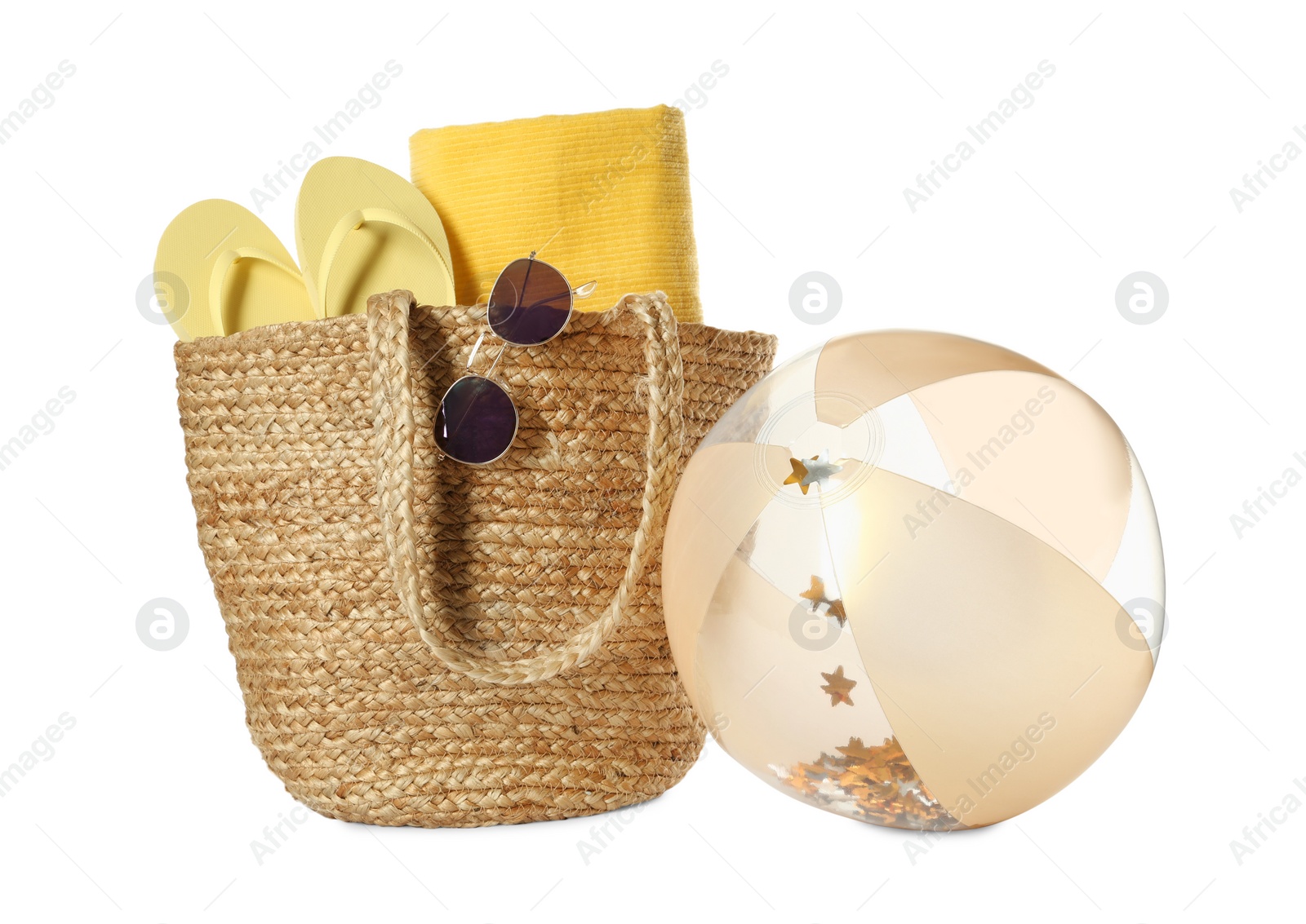 Photo of Inflatable ball and beach accessories on white background