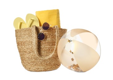 Inflatable ball and beach accessories on white background