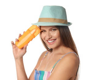 Photo of Woman with bottle of sun protection body cream on white background