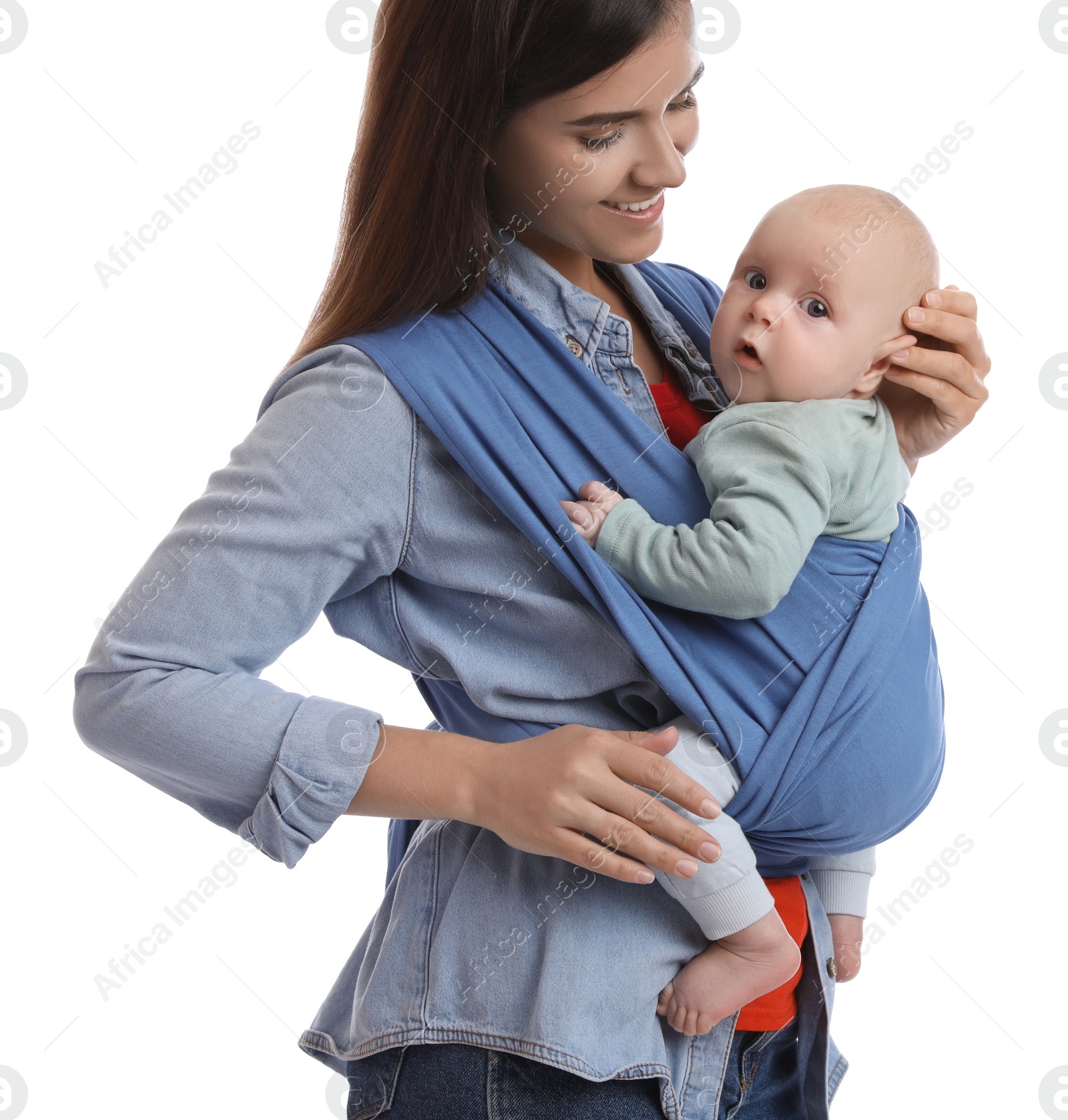 Photo of Mother holding her child in sling (baby carrier) on white background, closeup