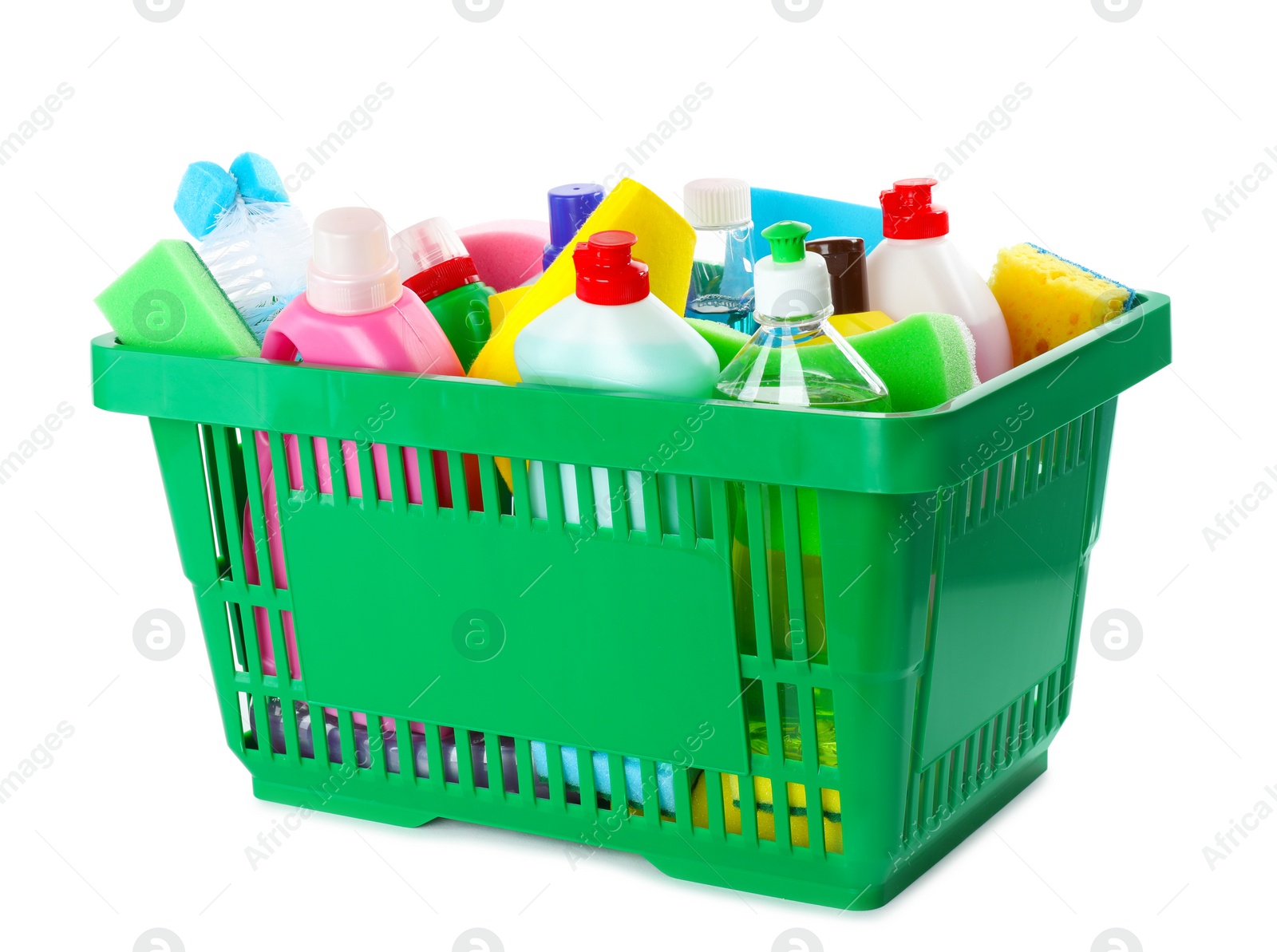 Photo of Green shopping basket with different household chemicals on white background