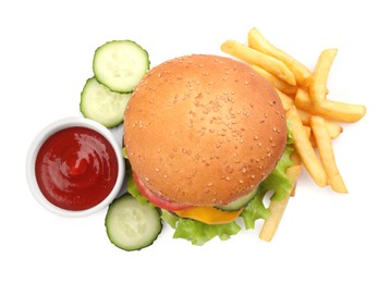 Photo of French fries, tasty burger and ingredients on white background, top view