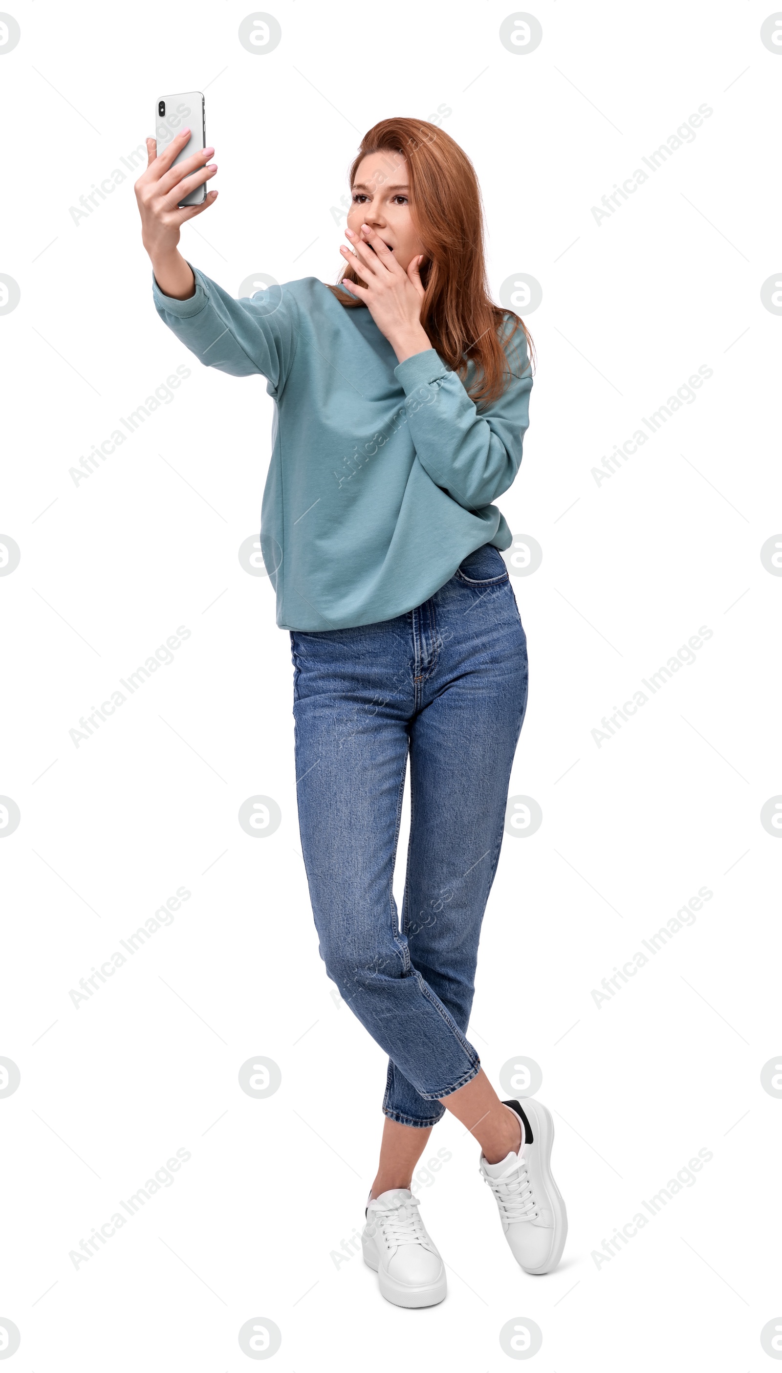 Photo of Beautiful woman taking selfie on white background