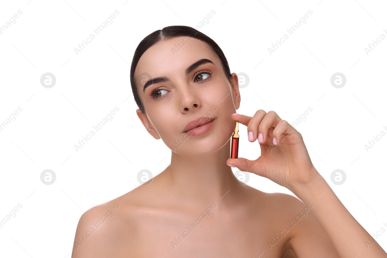 Photo of Beautiful young woman holding skincare ampoule on white background