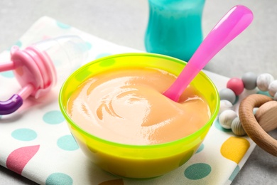 Healthy baby food on grey table, closeup