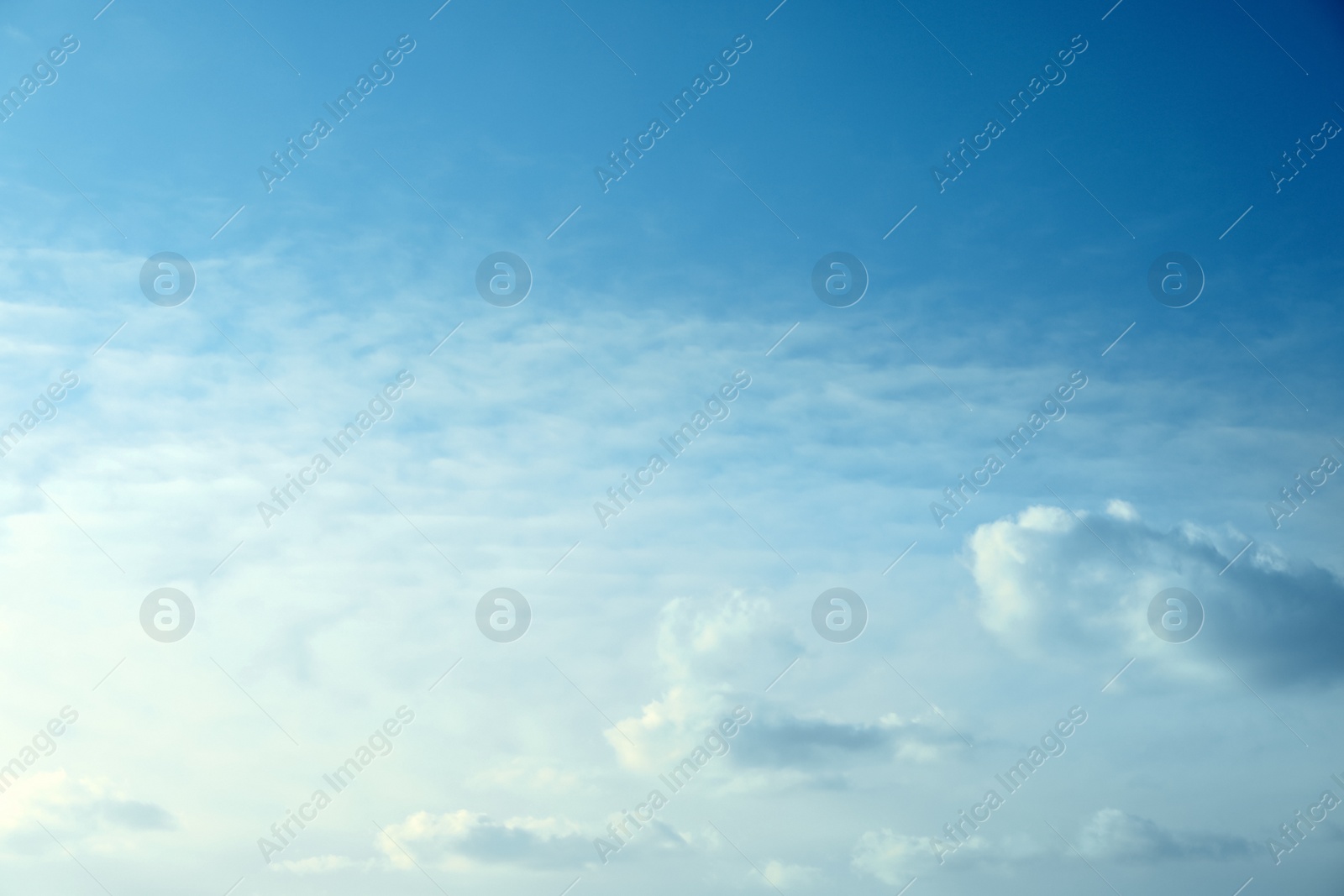 Photo of Beautiful light blue sky with fluffy clouds