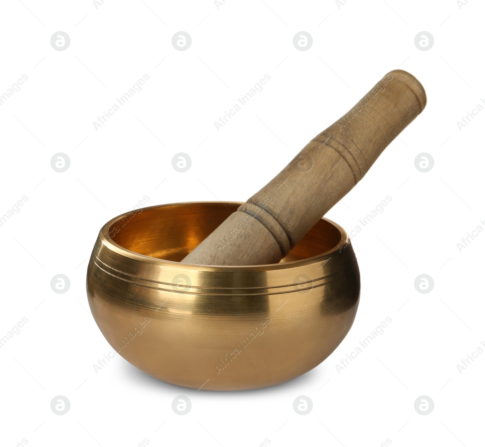 Photo of Tibetan singing bowl with wooden mallet isolated on white