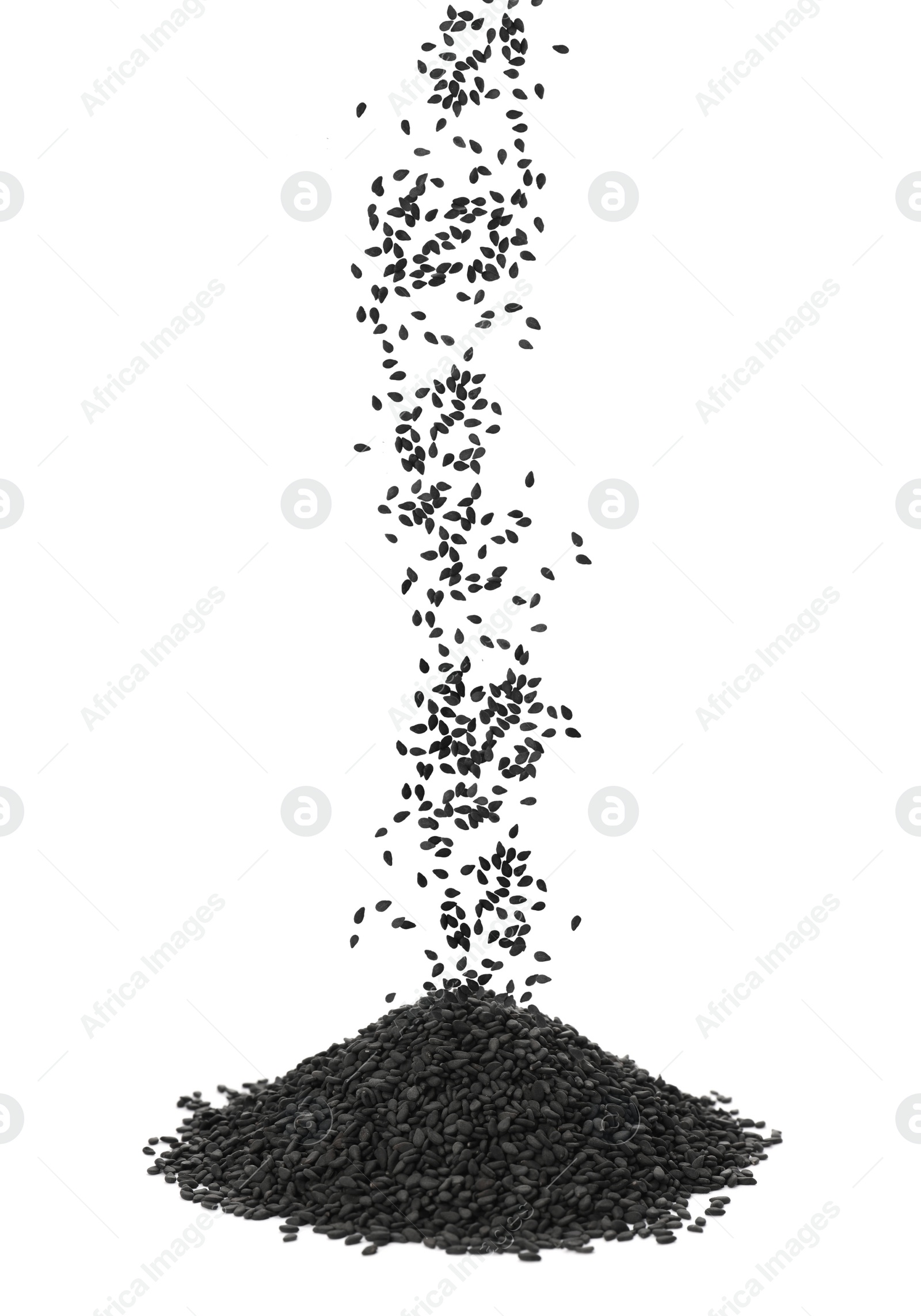 Image of Black sesame seeds falling into pile on white background