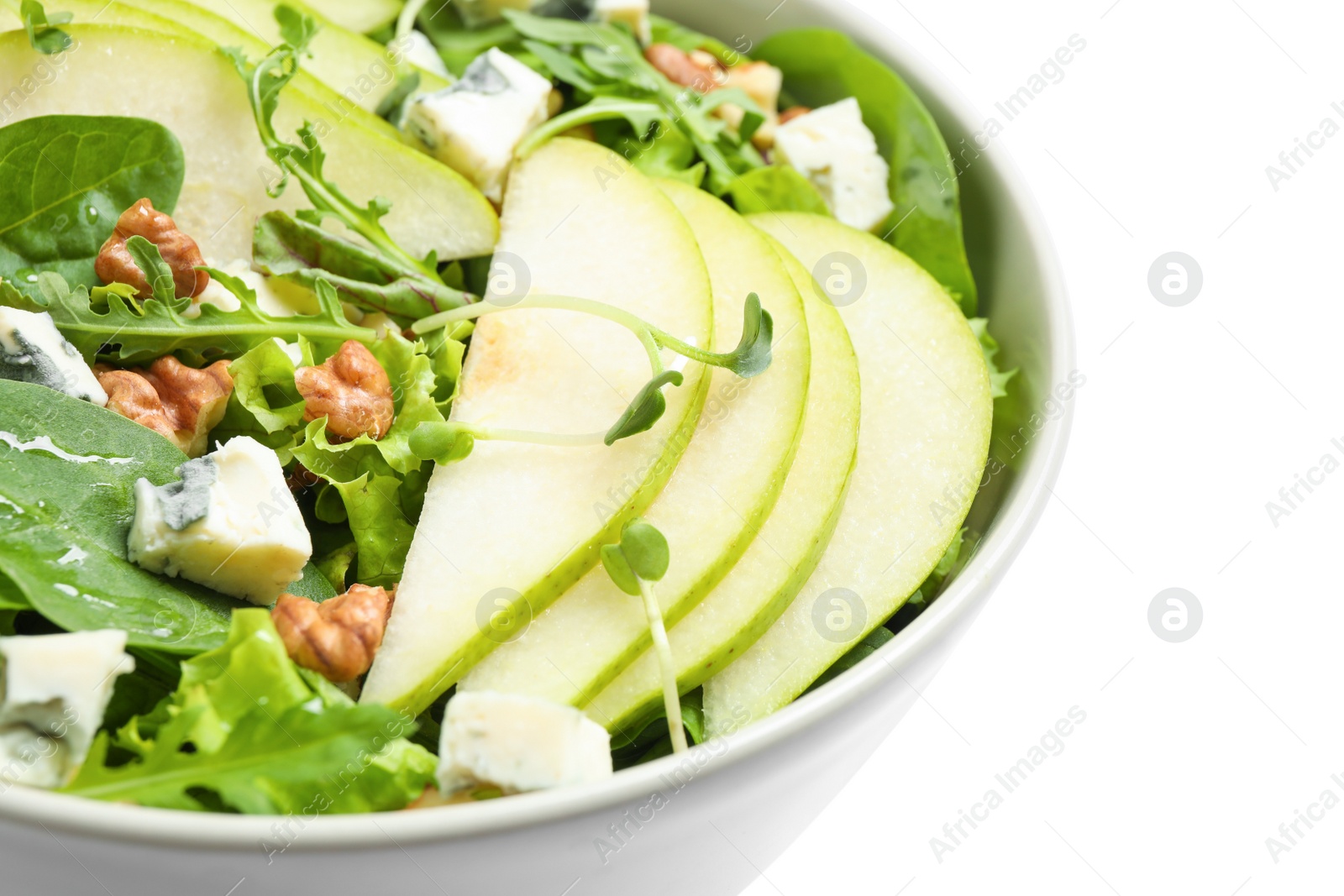Photo of Tasty salad with pear slices on white background, closeup