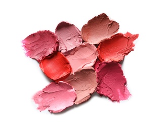 Photo of Collection of lipstick swatches on white background, top view