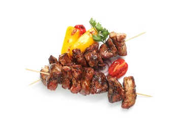 Photo of Delicious shish kebabs, parsley and vegetables isolated on white, top view