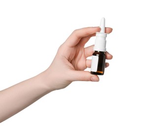 Photo of Woman holding nasal spray on white background, closeup