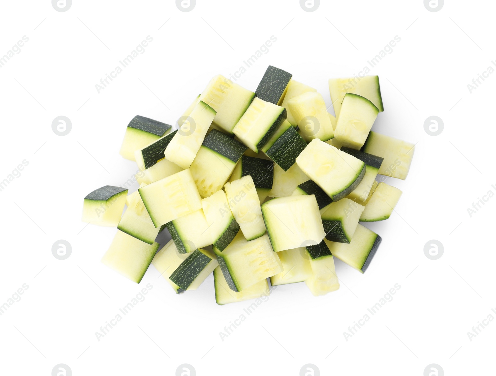 Photo of Pieces of ripe zucchini on white background, top view