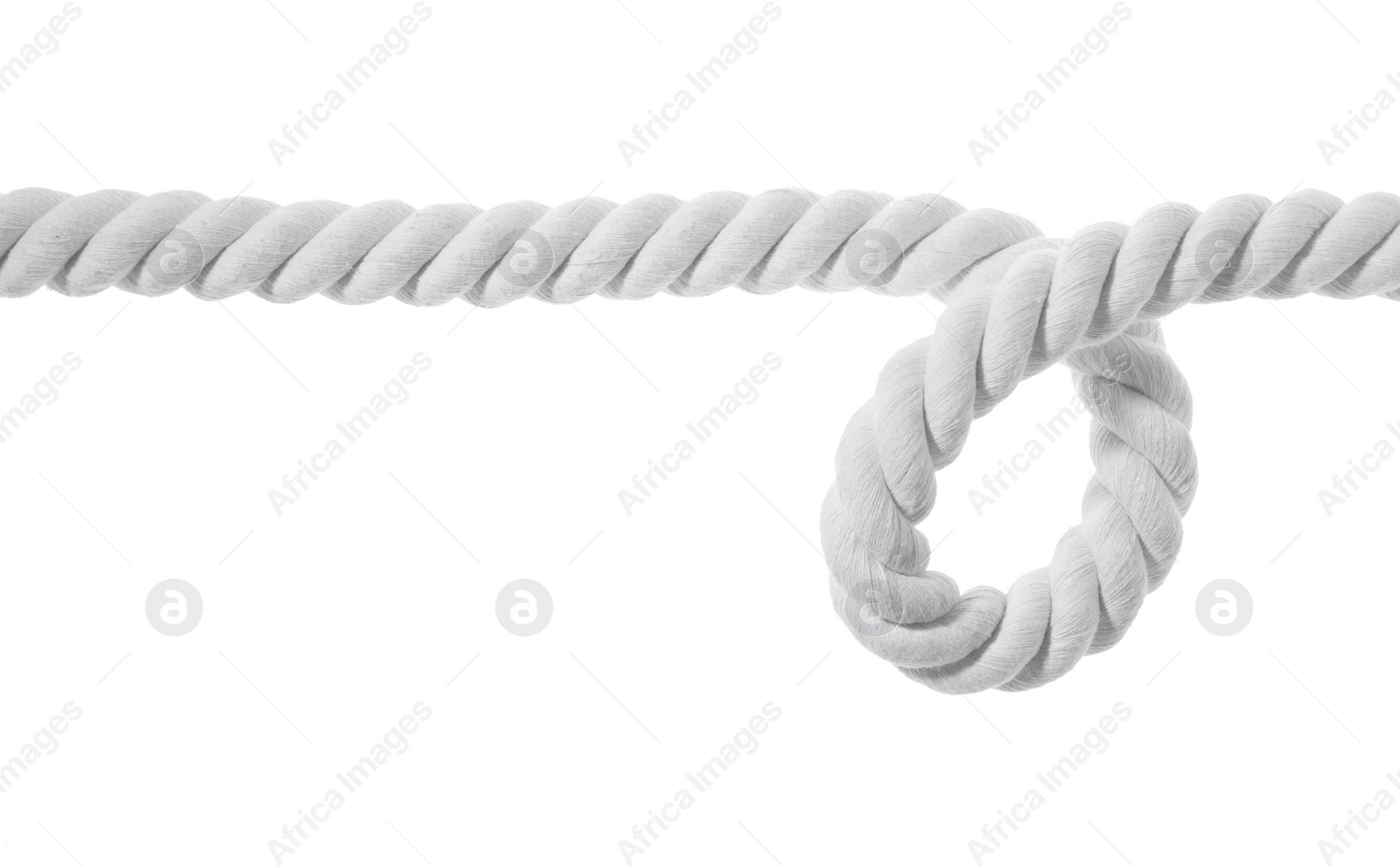 Photo of Hemp rope isolated on white. Natural material