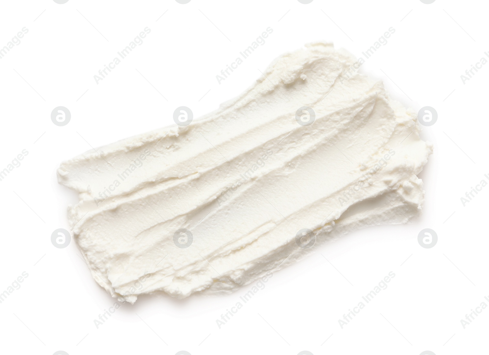 Photo of Smear of tasty cream cheese on white background, top view