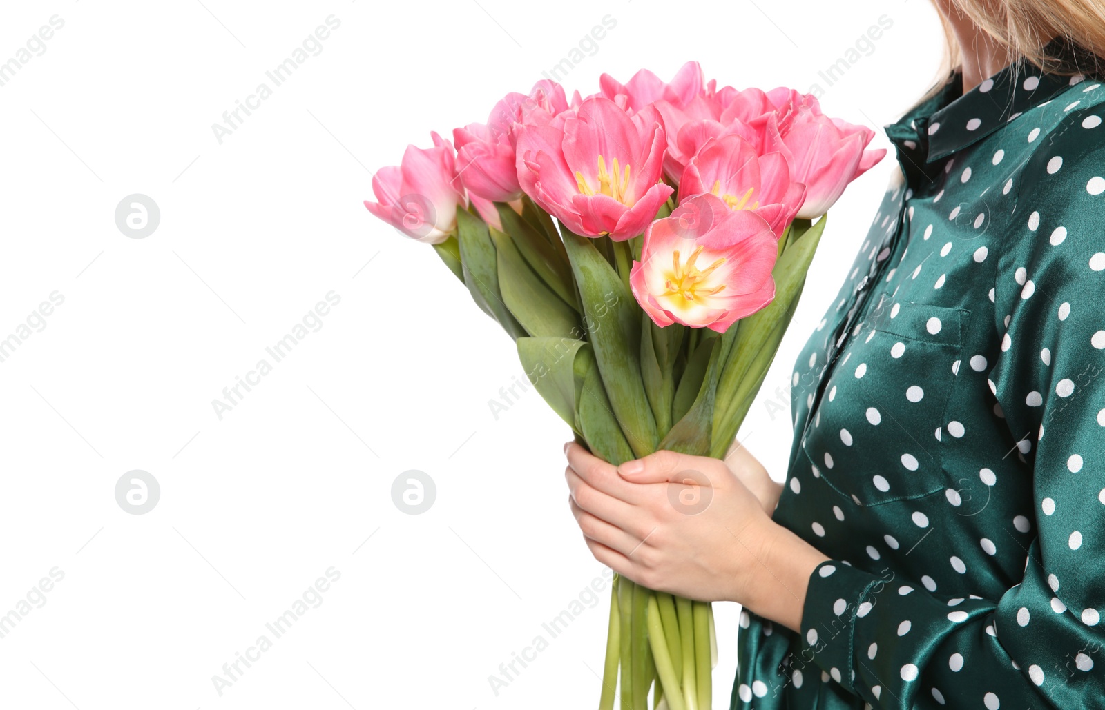 Photo of Young girl with beautiful tulips on white background, closeup. International Women's Day