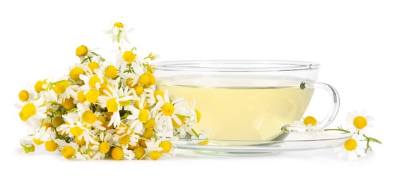 Photo of Aromatic herbal tea in glass cup with chamomile flowers isolated on white