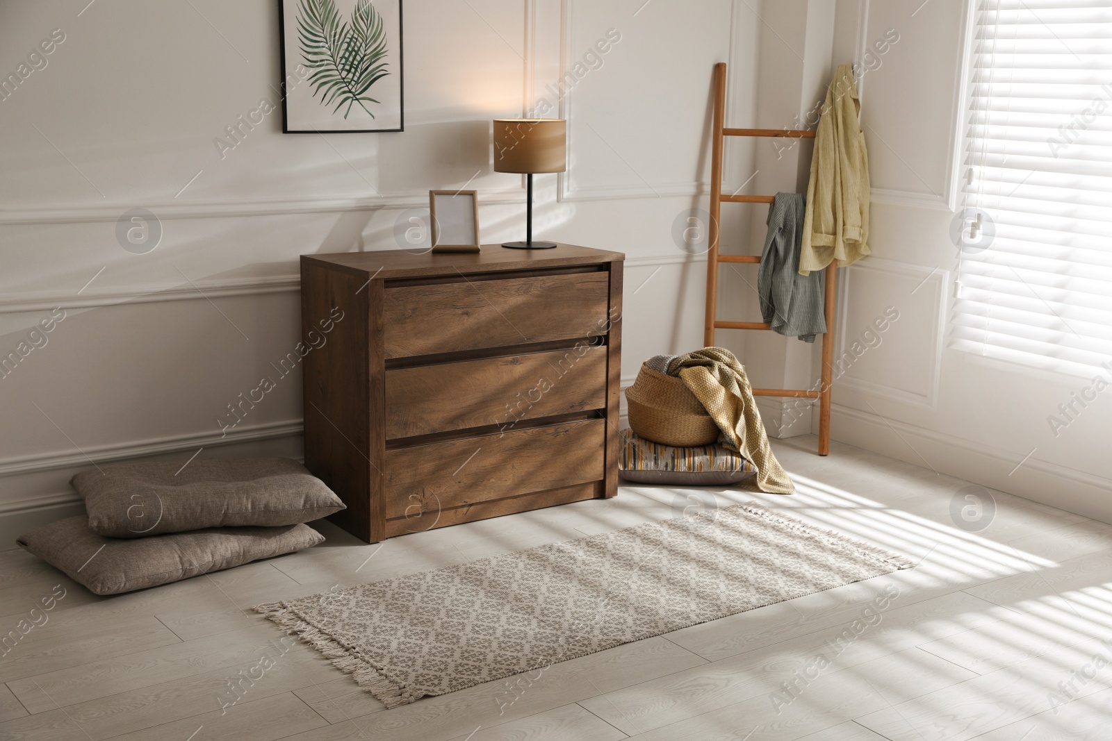 Photo of Stylish rug with pattern on floor in room