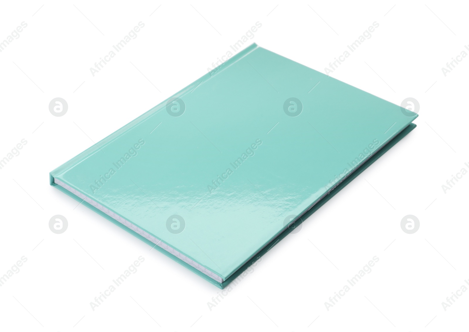 Photo of New bright turquoise planner isolated on white
