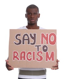 Photo of African American man holding sign with phrase Say No To Racism on white background