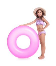 Cute little girl with inflatable ring on white background