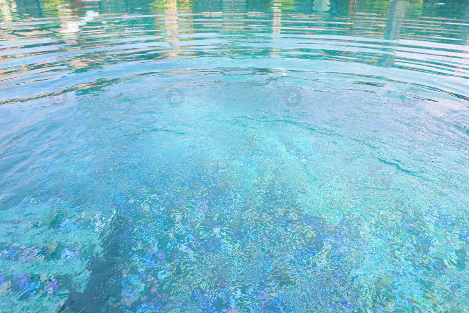 Photo of Clear water with ripples in outdoor swimming pool