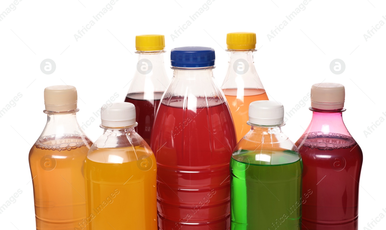 Photo of Bottles of soft drinks on white background, closeup