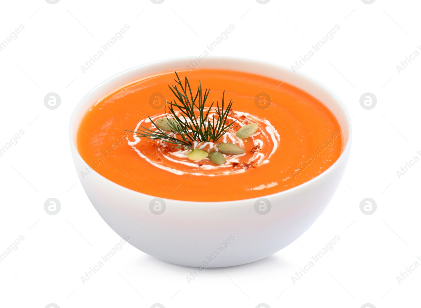 Photo of Delicious pumpkin soup in bowl isolated on white