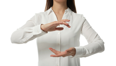 Photo of Businesswoman holding something on white background, closeup