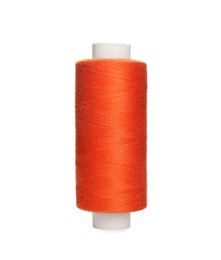 Spool of orange sewing thread isolated on white