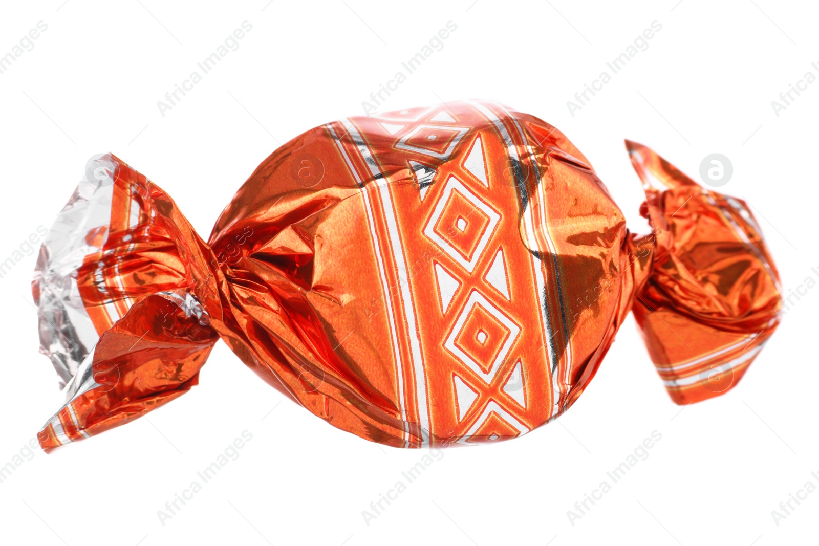 Photo of Candy in orange wrapper isolated on white