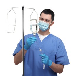 Photo of Nurse setting up IV drip on white background