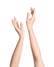 Woman against white background, closeup on hands