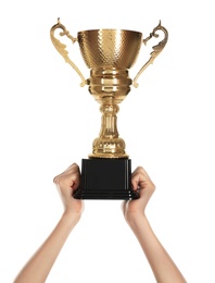 Photo of Young woman holding gold trophy cup on white background, closeup