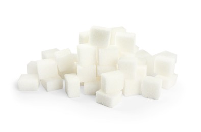 Photo of Pile of refined sugar cubes on white background