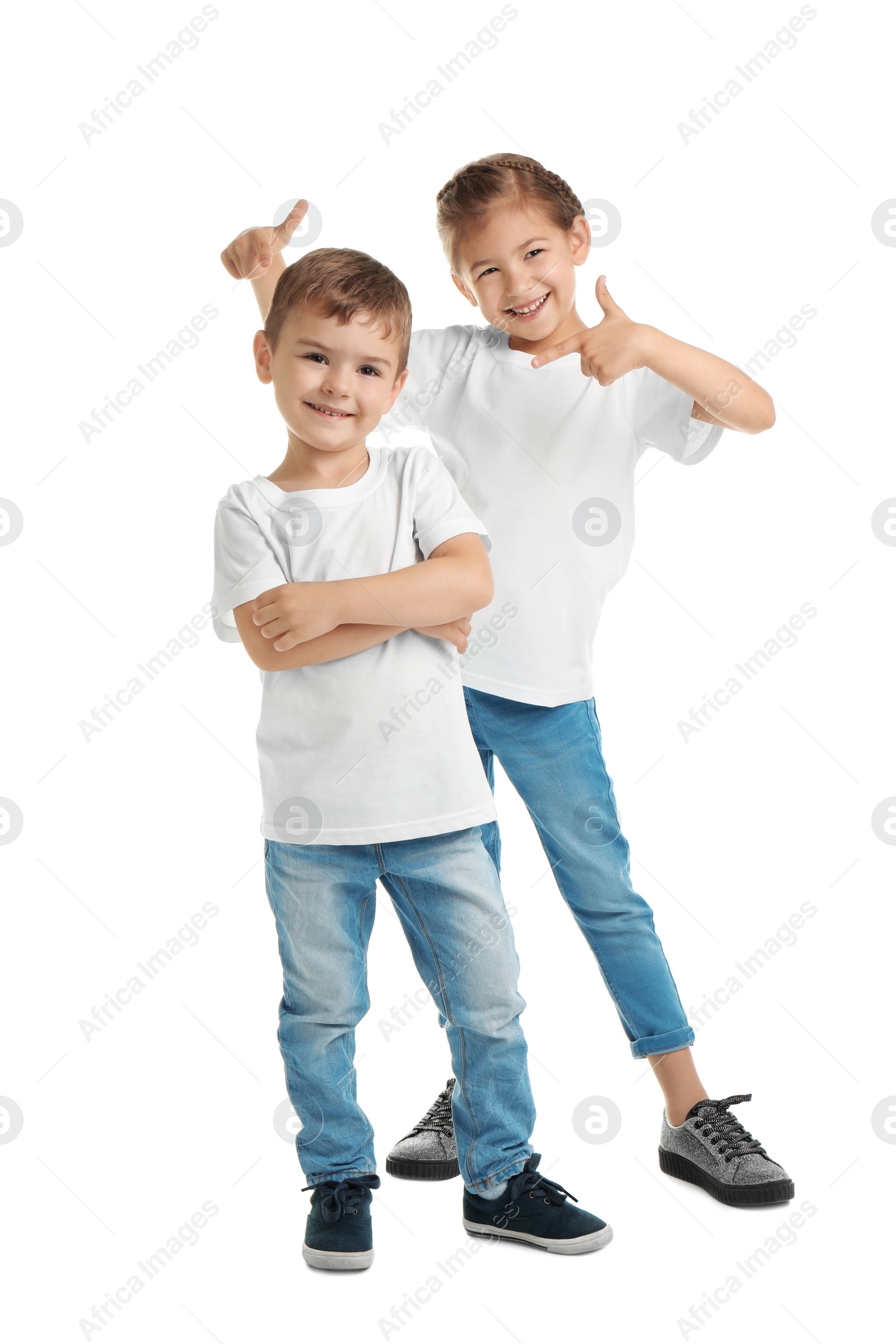 Photo of Little kids in t-shirts on white background. Mockup for design