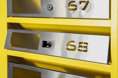 Photo of New metal mailbox with key and numbers, closeup