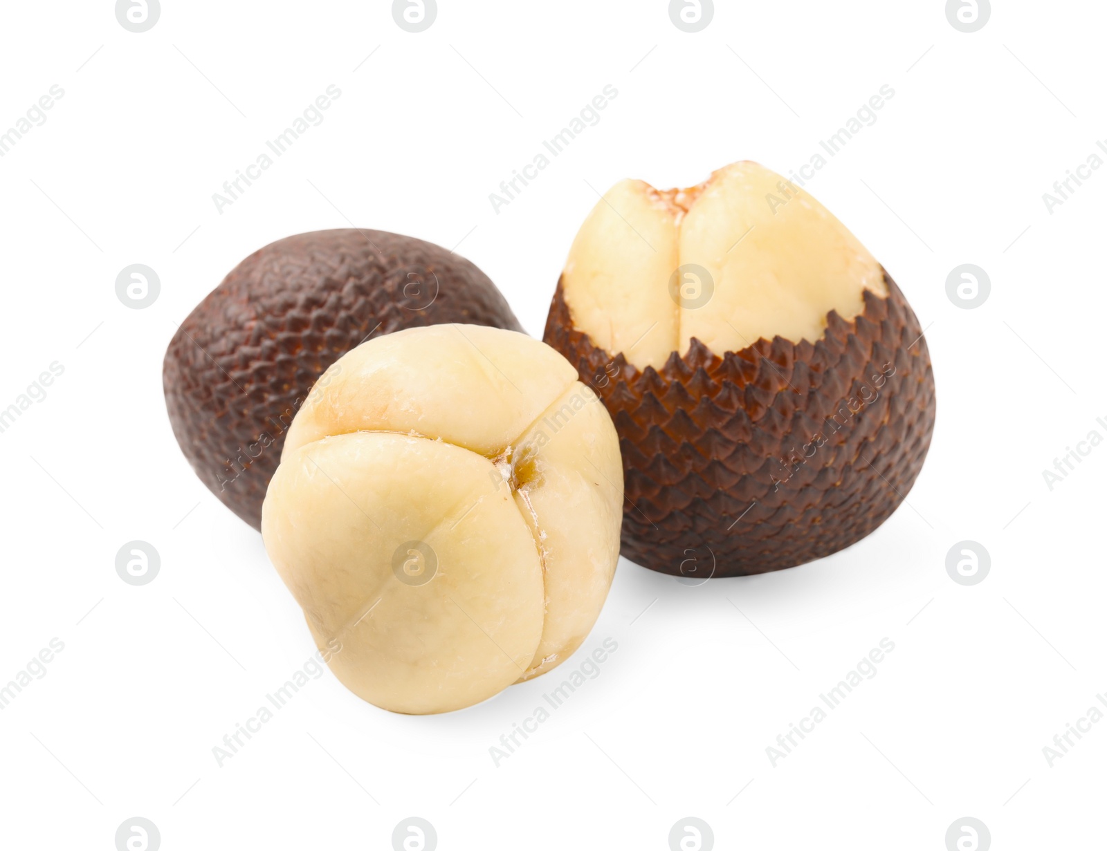 Photo of Three fresh salak fruits isolated on white