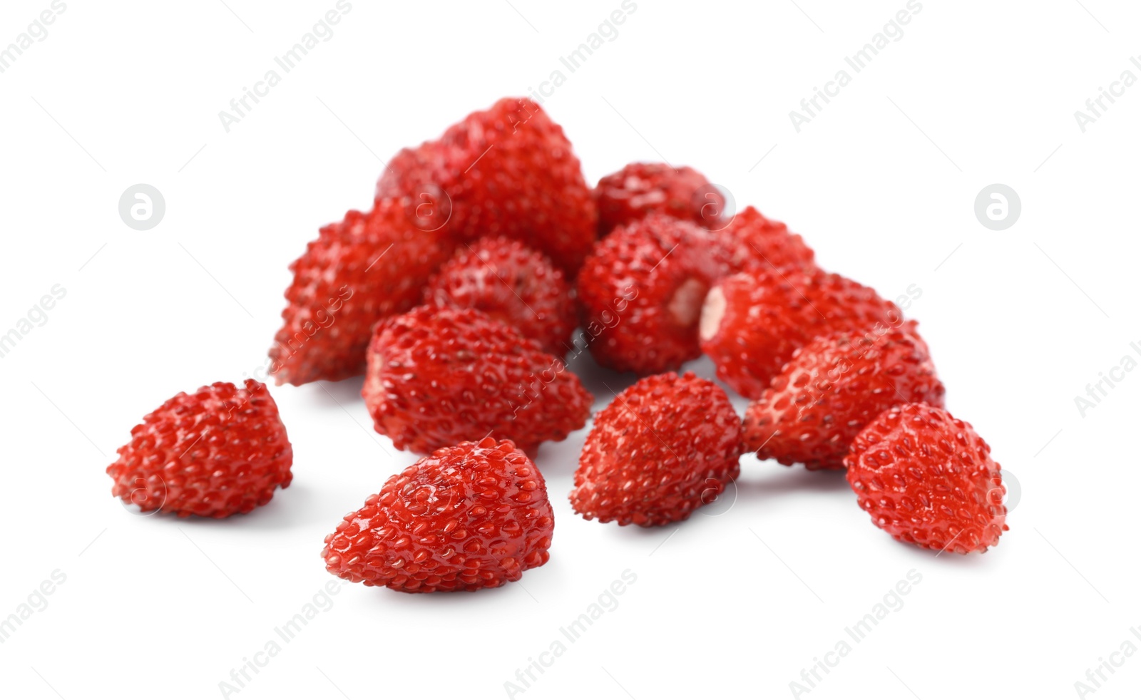 Photo of Ripe red wild strawberries isolated on white