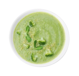 Photo of Delicious broccoli cream soup isolated on white, top view