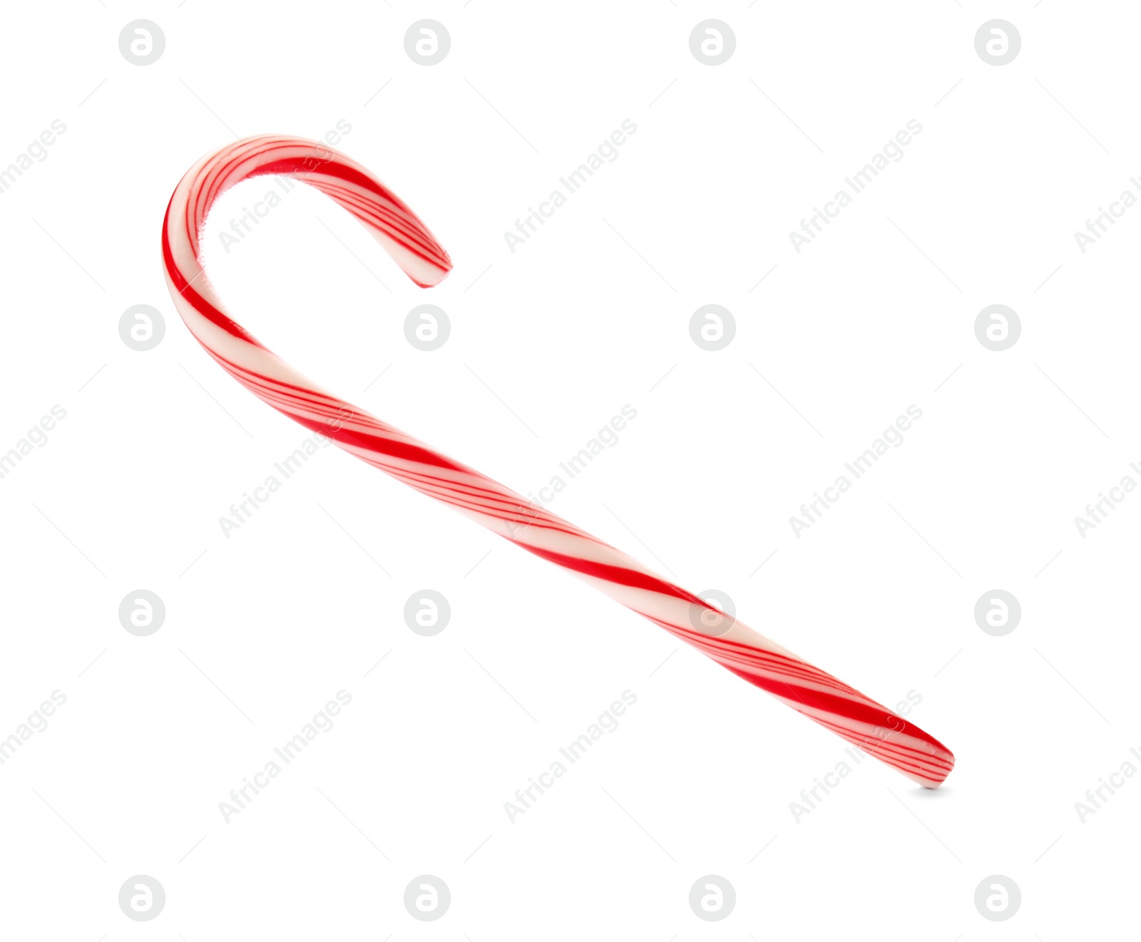 Photo of Tasty candy cane on white background. Festive treat