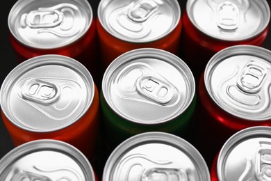 Energy drink in cans, closeup. Functional beverage