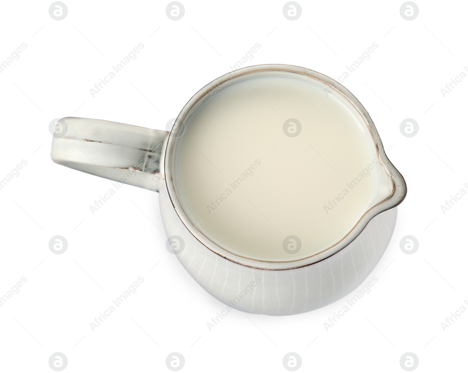 Photo of One jug full of fresh milk isolated on white, top view